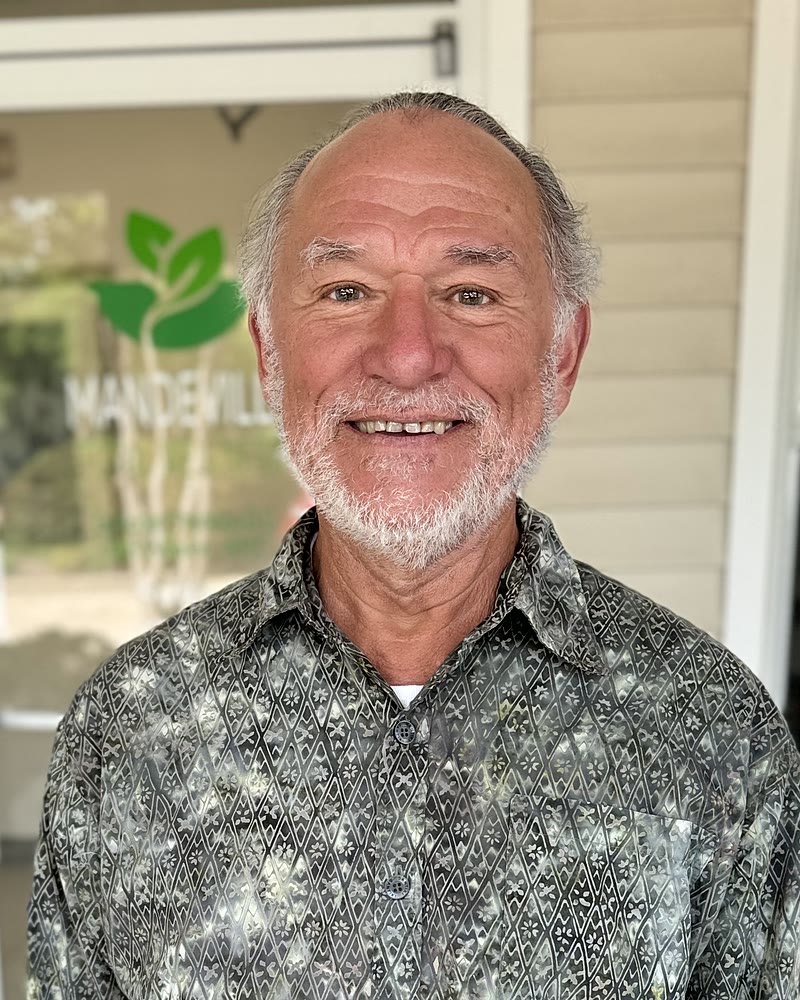 Dr. Bob Thomson, DC, founder of Mandeville Total Wellness, outside the practice in Mandeville, Louisiana