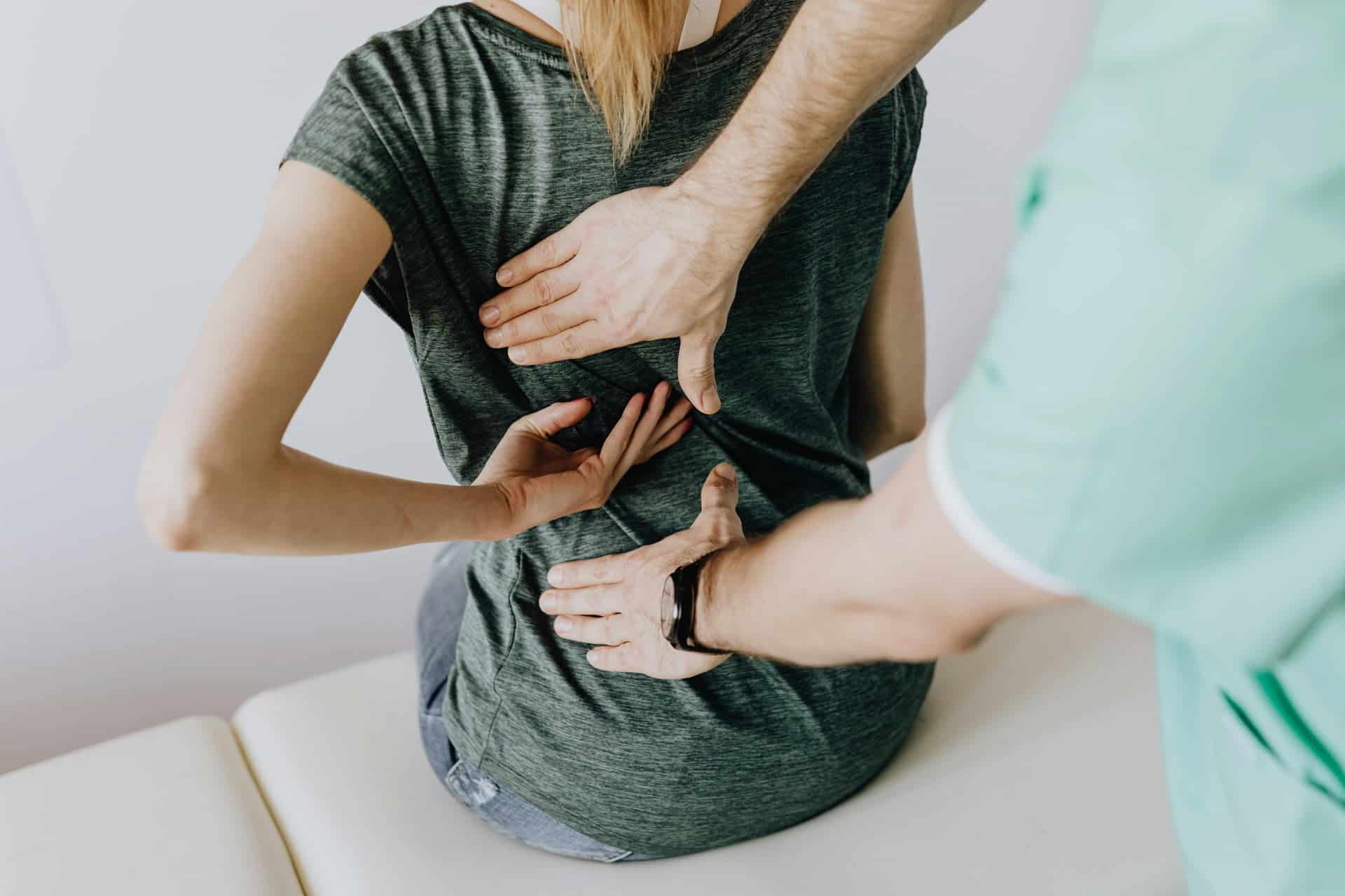 woman getting chiropractic care in Mandeville